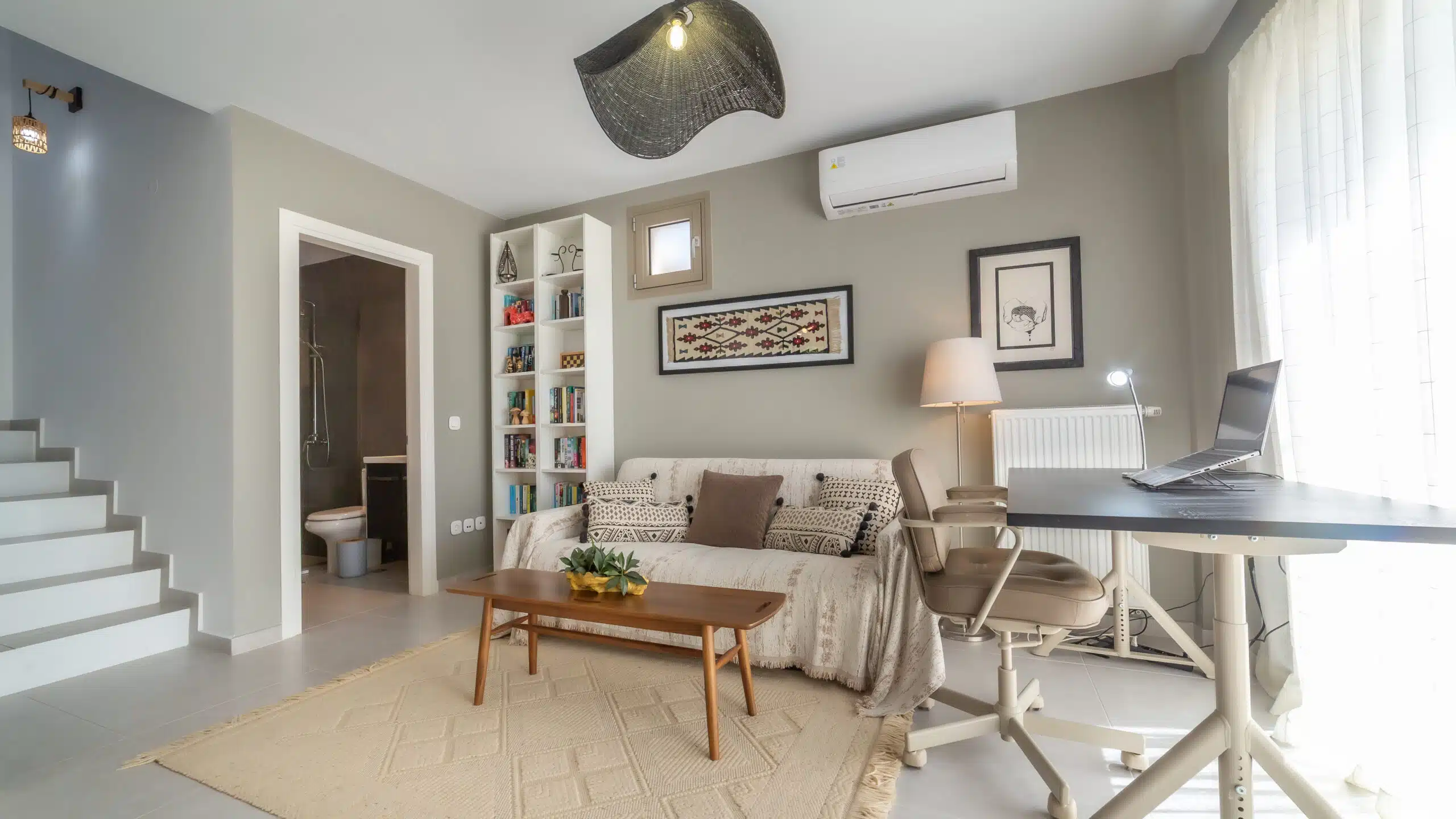 Image depicting the downstairs lounge area and desk