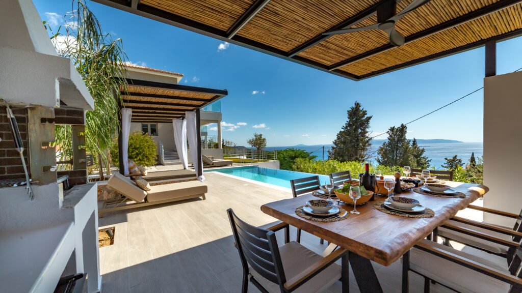 Image depicting the outside dining area towards pool